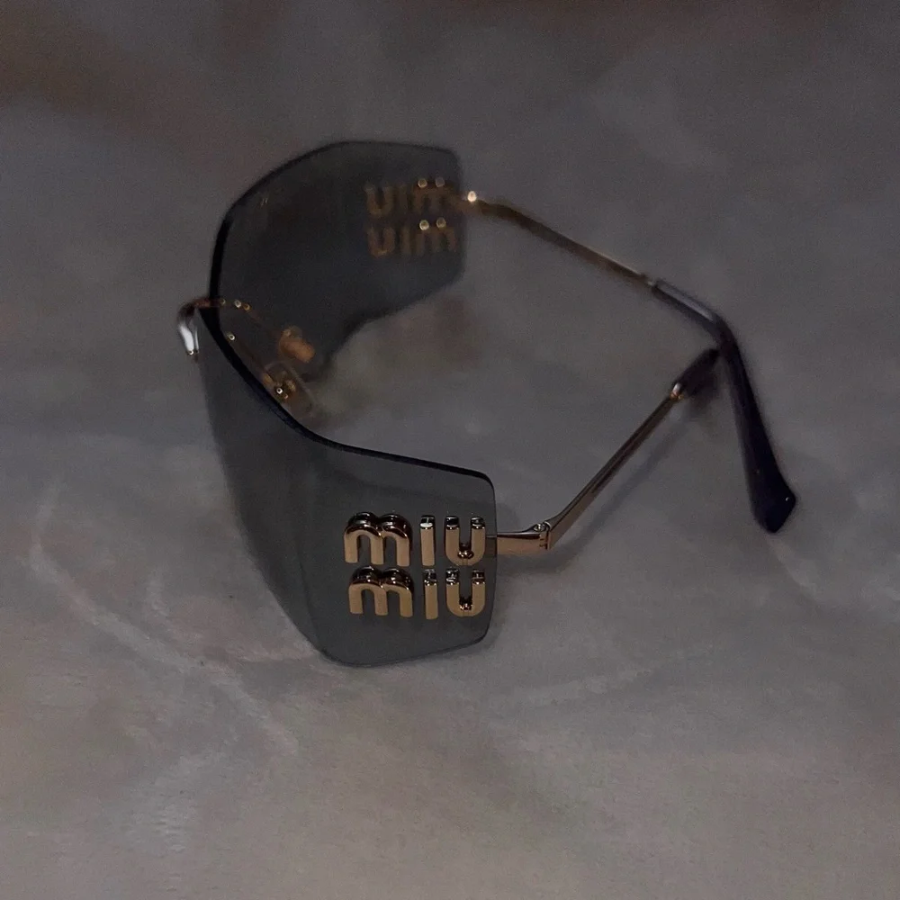 Miu Miu sunglasses women’s - Picture 5 of 9